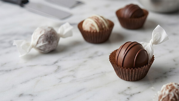 Chocolate truffles individually wrapped in pure virgin pulp confectionery packaging paper