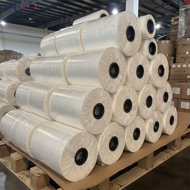 Pallets of jumbo transfer paper sublimation rolls tightly wrapped and ready for dispatch at our sublimation transfer paper factory