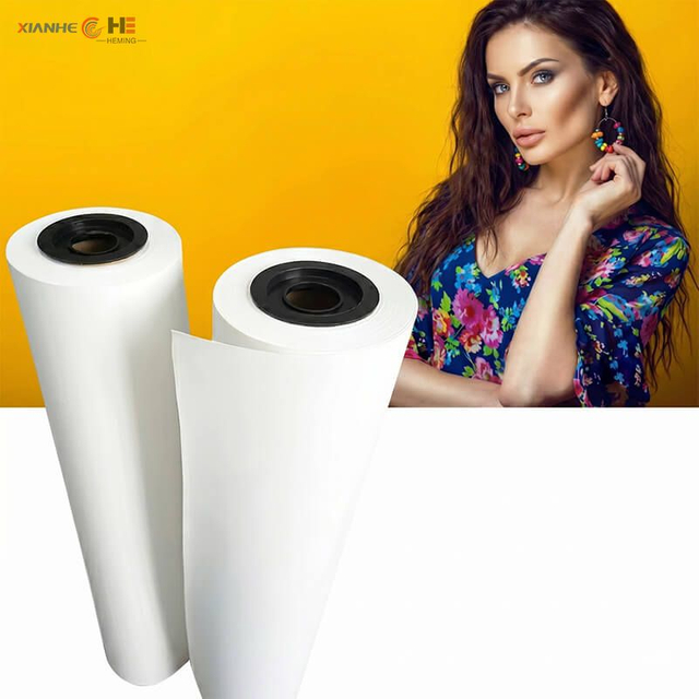 Premium 33-52gsm rolls showcasing the best transfer paper for sublimation printing on apparel and fashion garments