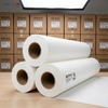 bulk inventory of 42gsm and 52gsm sublimation paper rolls in factory warehouse