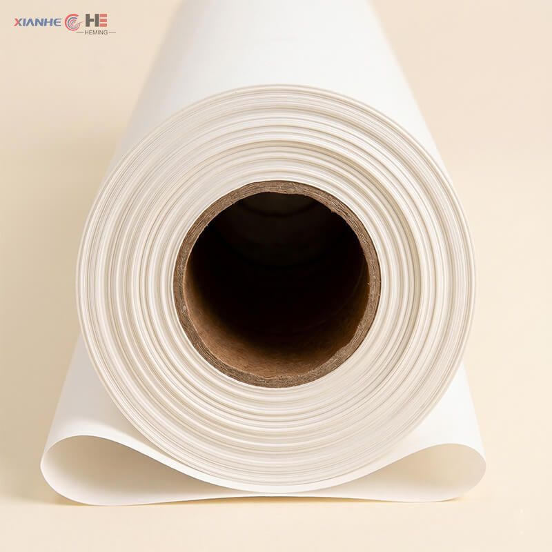 Close-up of an industrial-grade sublimation paper roll with heavy-duty core for high-speed commercial plotters