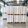 Bulk greaseproof paper sheet reams secured on ISPM-15 fumigated wooden export pallets
