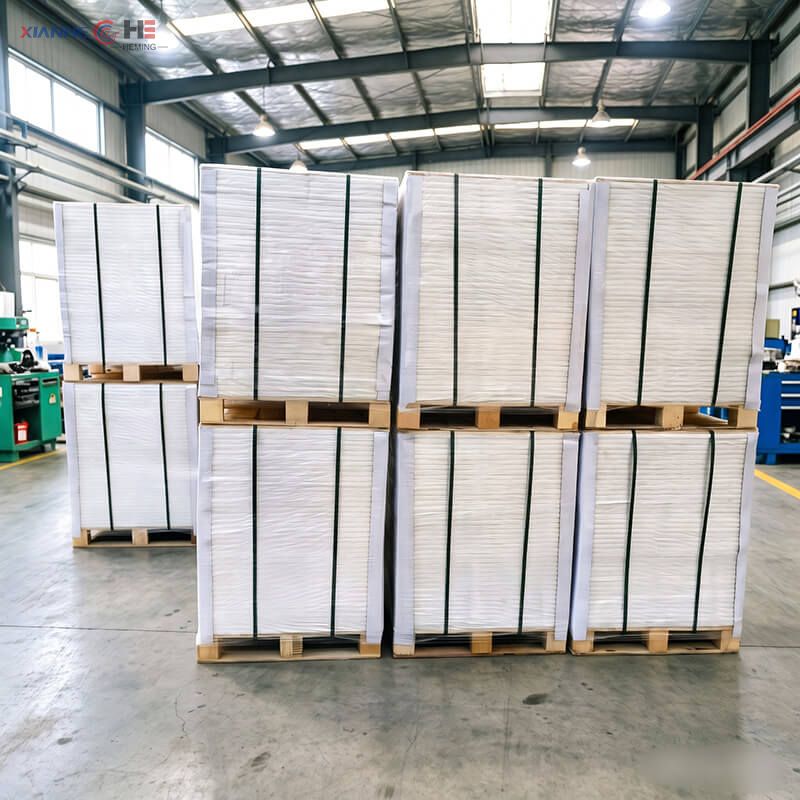 Bulk greaseproof paper sheet reams secured on ISPM-15 fumigated wooden export pallets