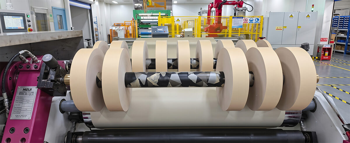 Precision cutting and winding process of custom electrolytic capacitor paper rolls
