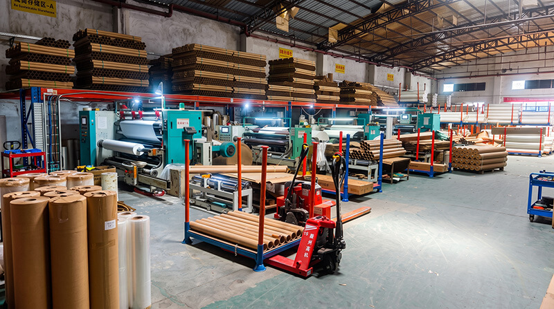 Precision paper slitting machine rewinding custom roll widths at Dongguan converting plant near Shenzhen port