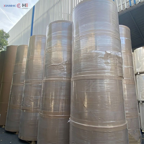 Wholesale greaseproof paper jumbo rolls stored in factory warehouse