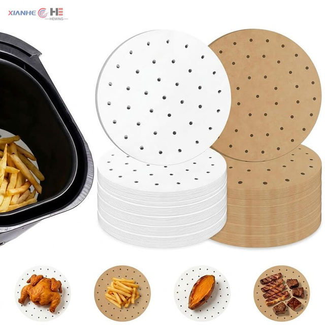 Non-stick perforated parchment paper rounds used in air fryer basket for french fries, chicken wings, and baking