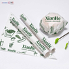 Custom printed greaseproof paper sheets used for wrapping hamburgers and fast food
