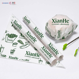 Custom printed greaseproof paper sheets used for wrapping hamburgers and fast food