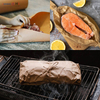 Applications of brown butcher paper rolls for wrapping raw meat, fresh salmon, and smoking brisket