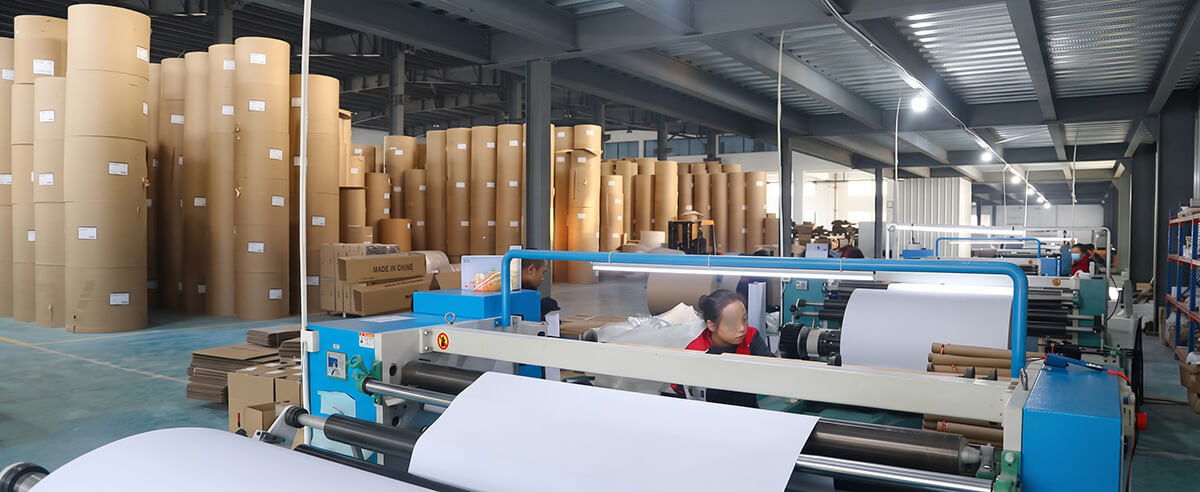 Precision slitting and rewinding machinery line converting greaseproof paper rolls in Heming factory